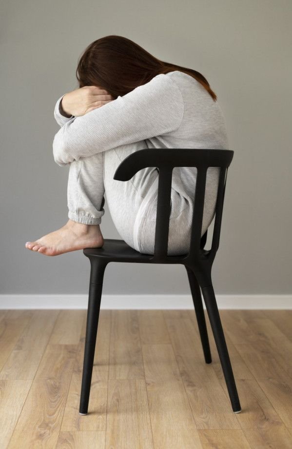Teenager avoiding a social gathering